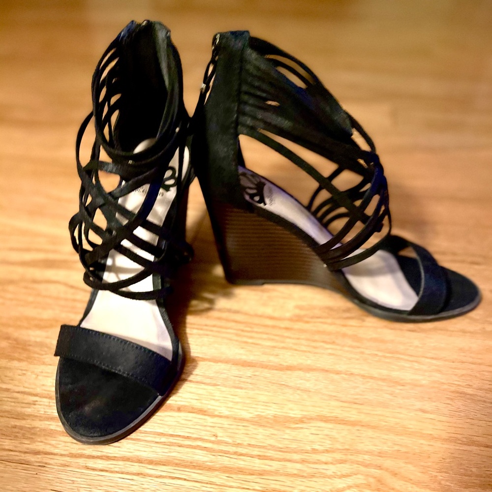 Shoes by Fergie Fergalicious. Black wedge straps
